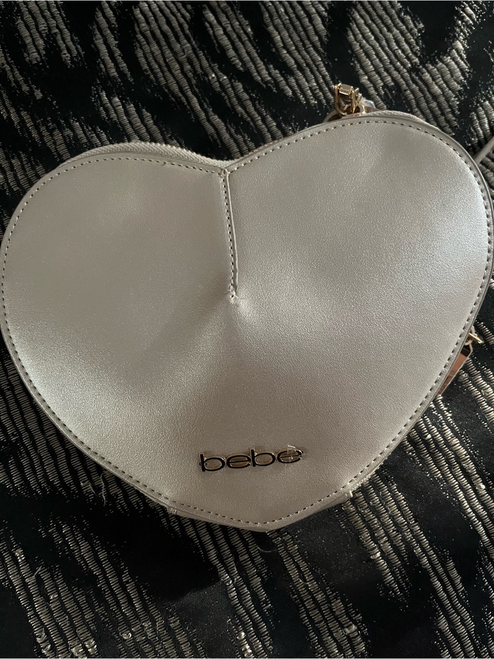 bebe Heart Mini Crossbody in Metallic Silver